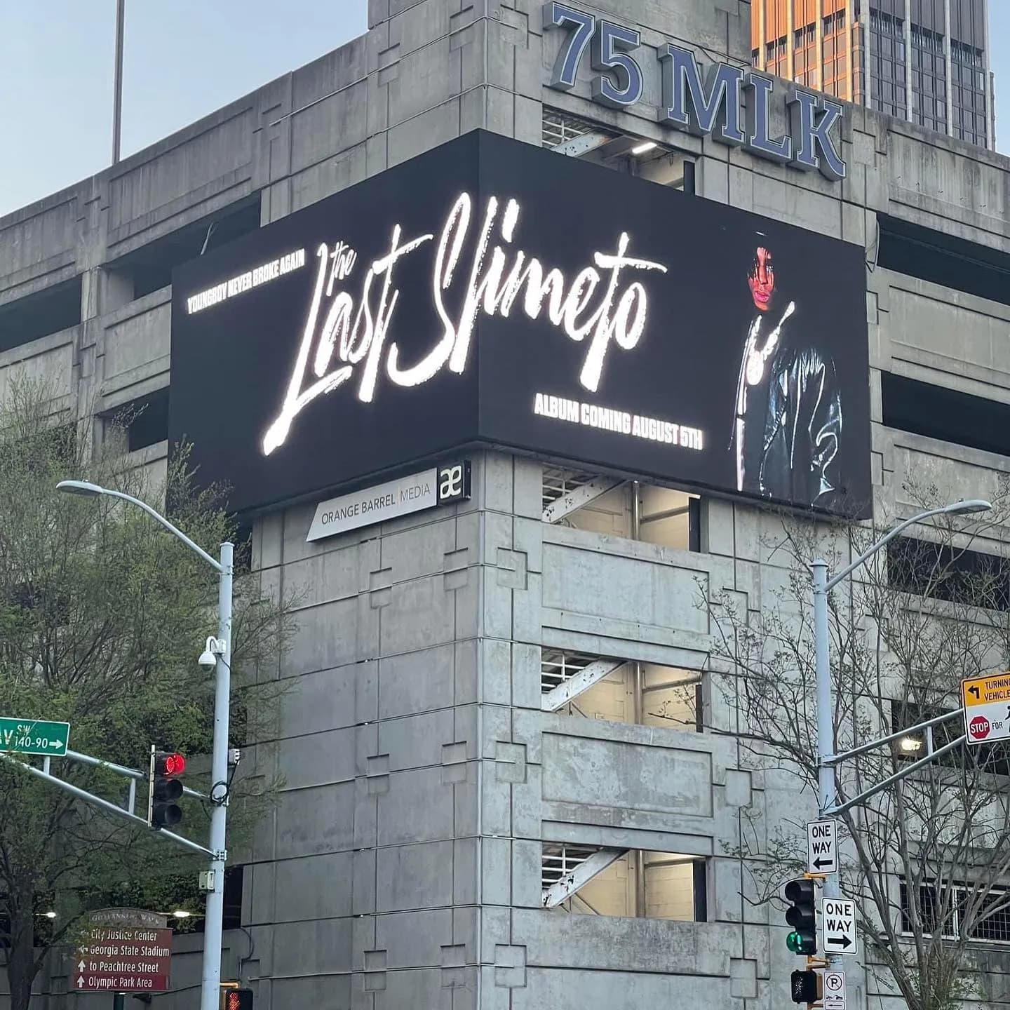 The Last Slimeto billboard on a downtown building